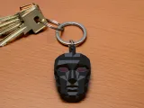 the Front Man keychain from Squid Game-0