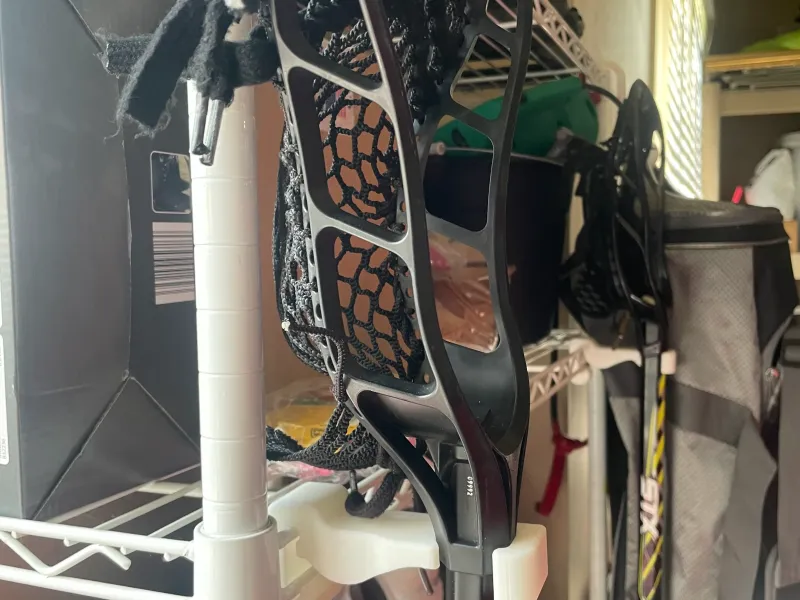 LaCrosse Stick storage device
