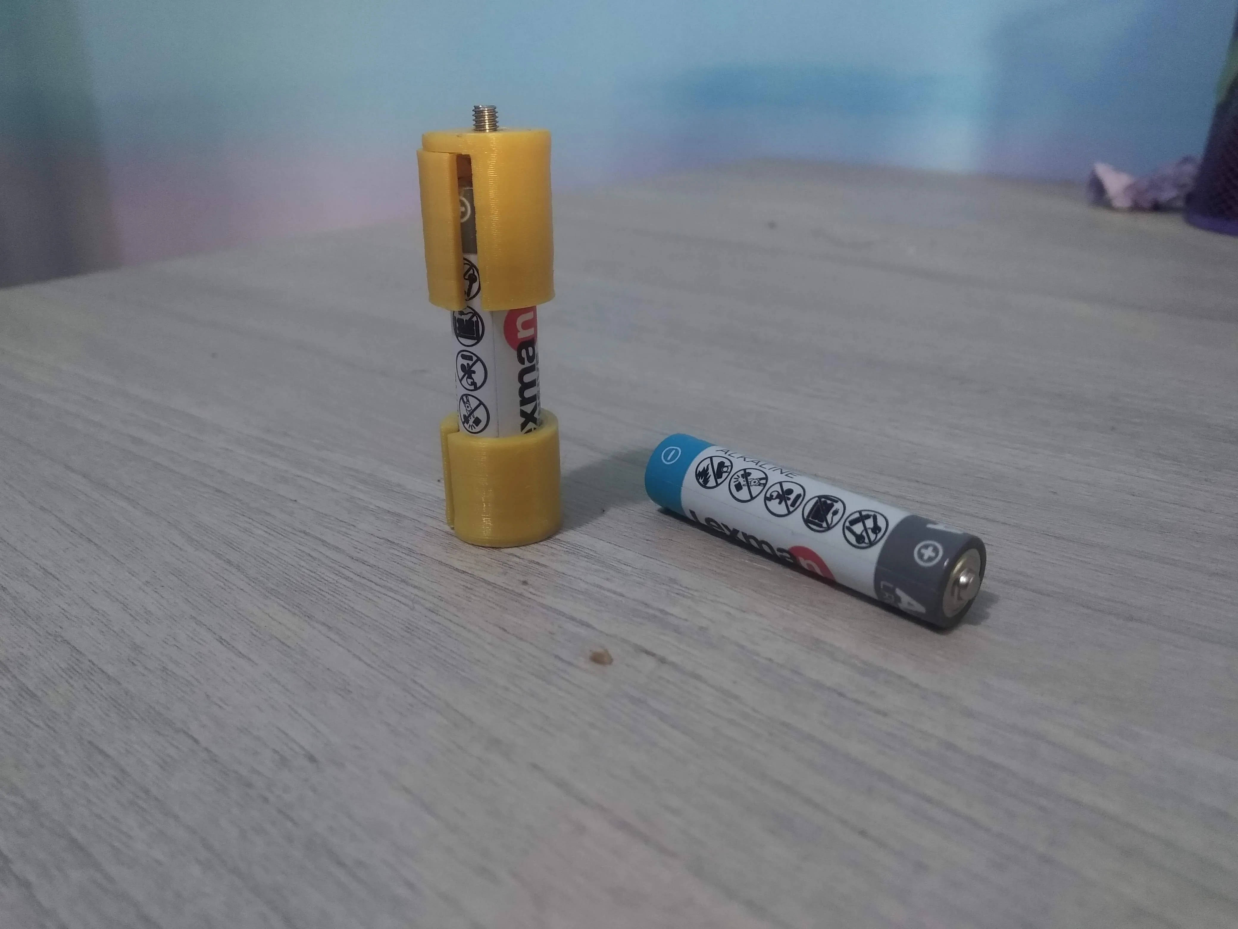 AAA to AA converter