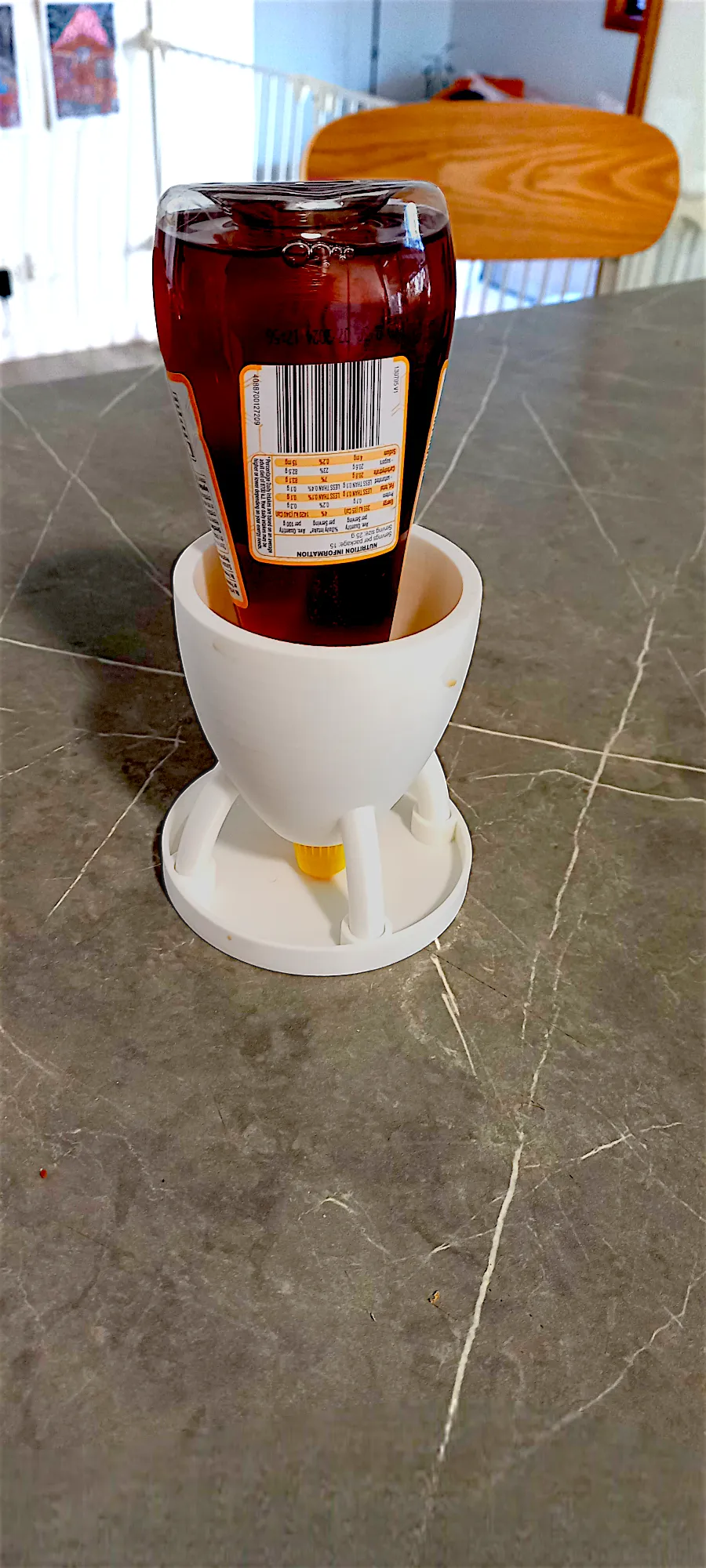 Upside down bottle holder