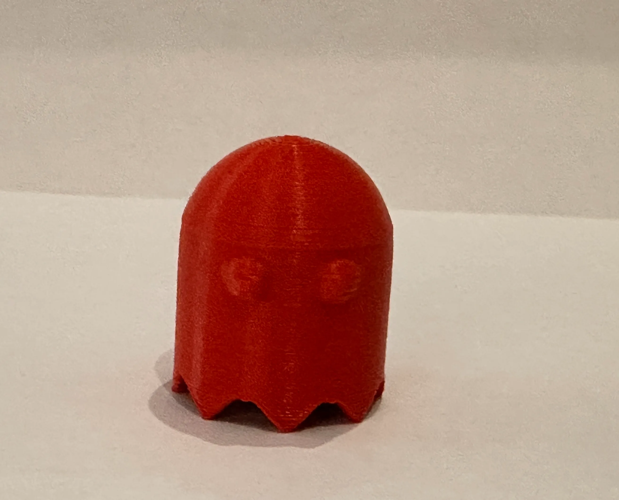 Pac Man fridge magnet with Halloween attachments.