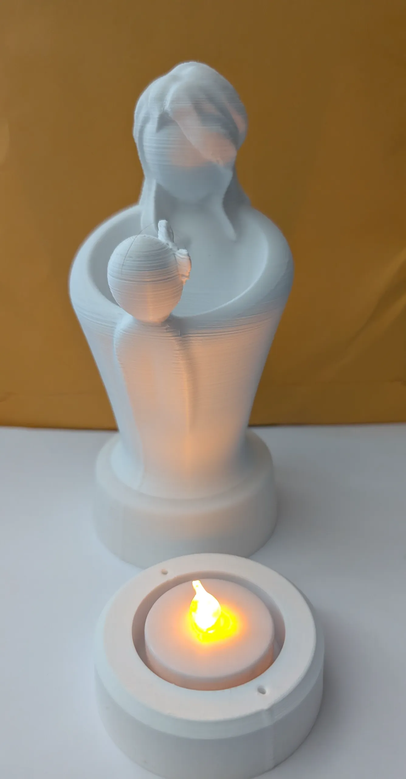 Mother and Daughter bracing their love  (NEEDS TEALIGHT)
