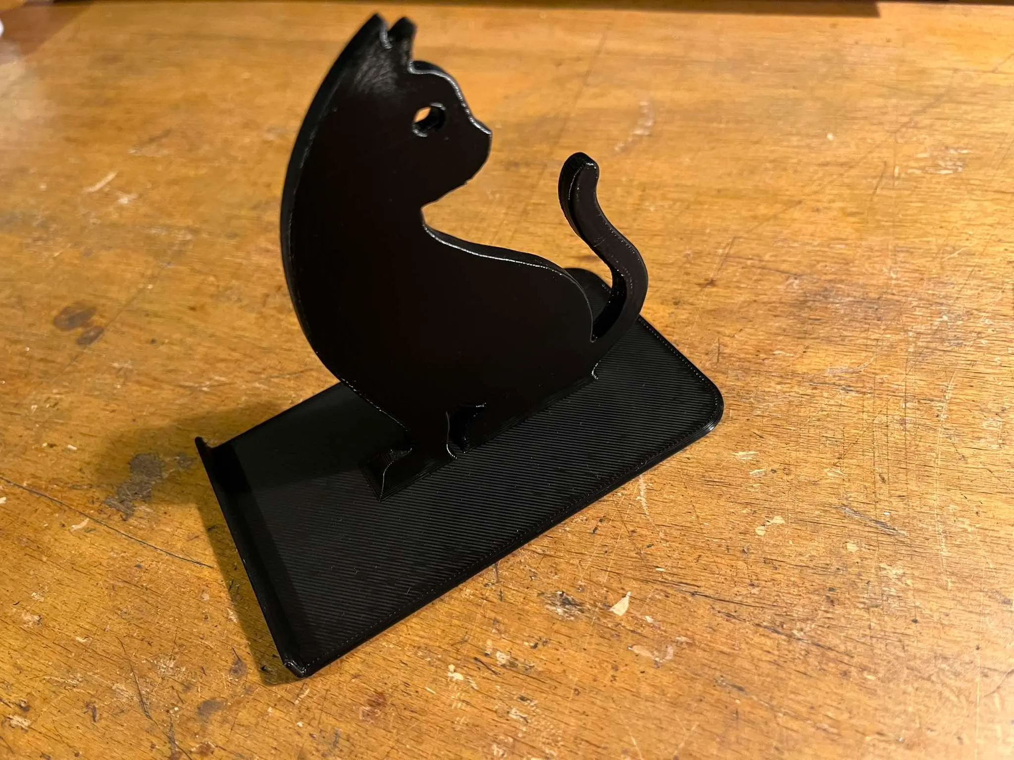 Phone, Mobile phone stand with cat motif