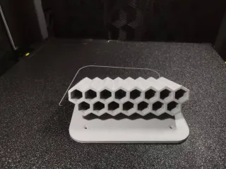 Wall-mounted pen holder