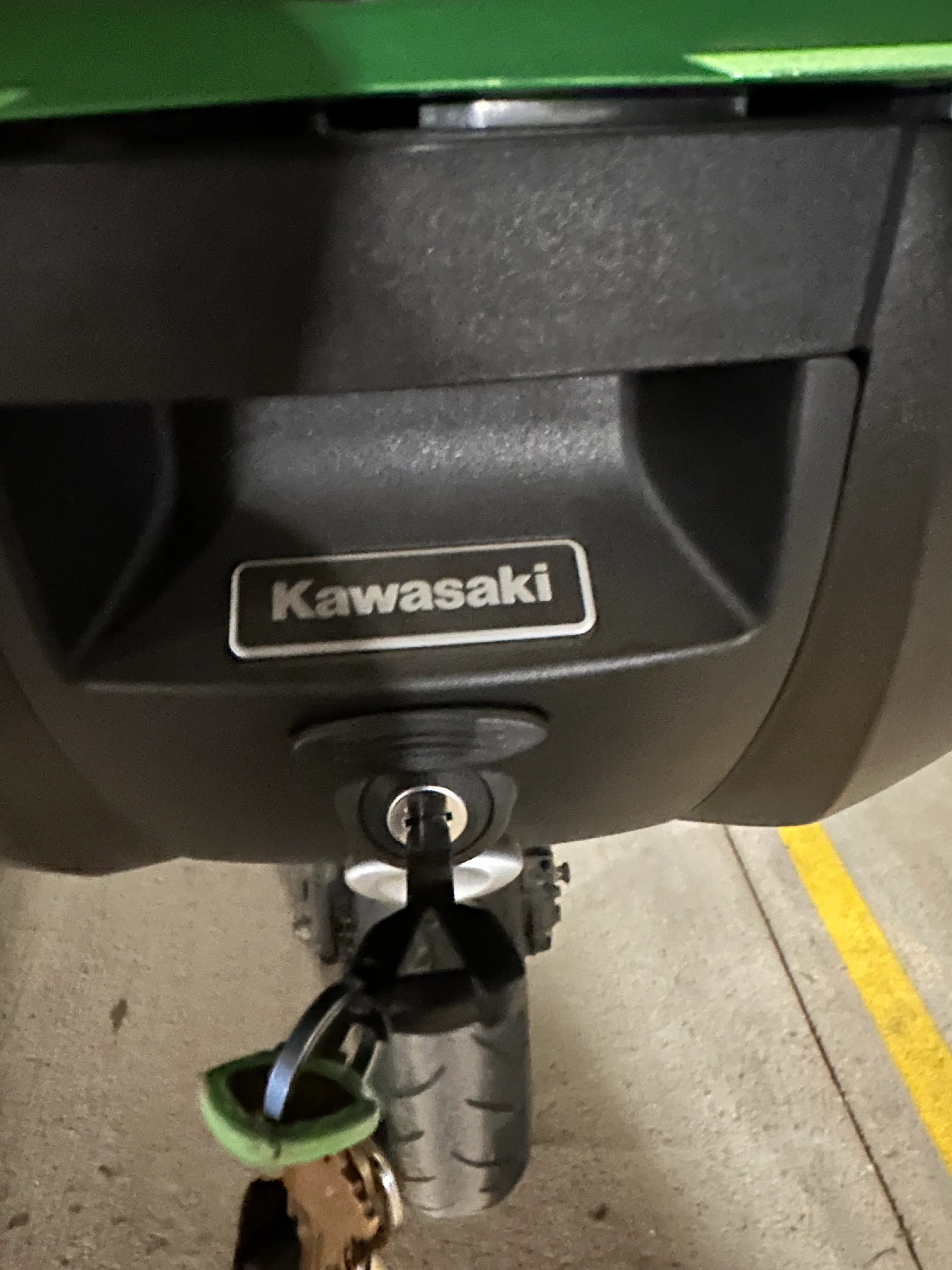Kawasaki KQR lock cylinder mount for luggage
