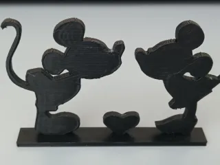 Mickey and Minnie kiss
