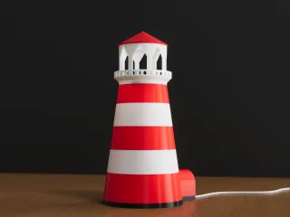 Night light in the form of a lighthouse