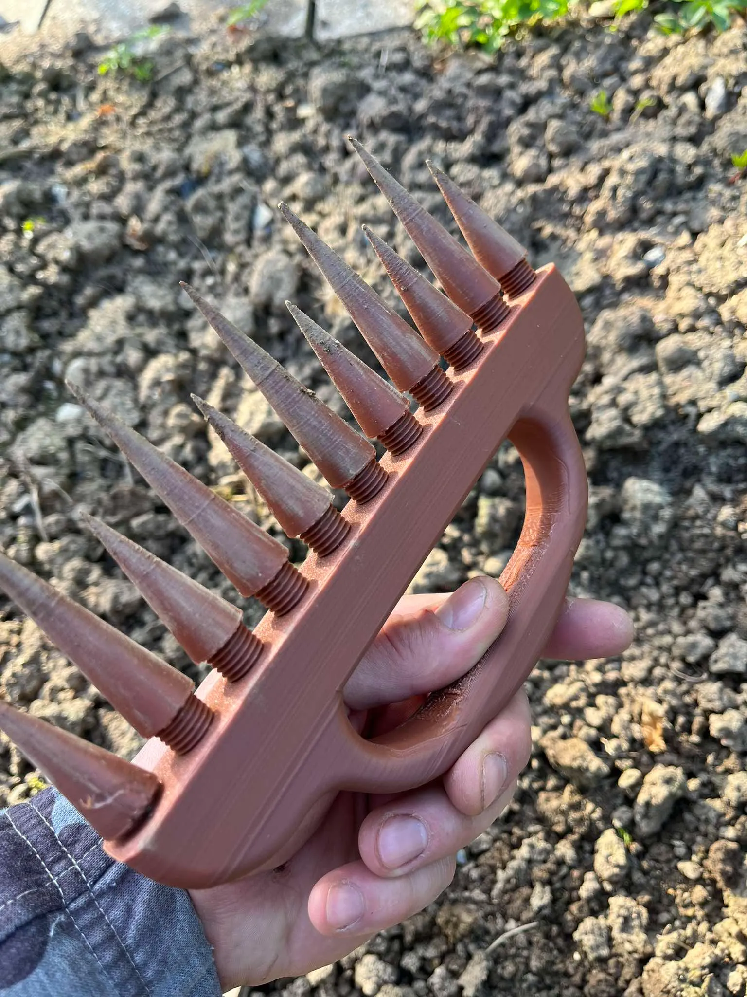 Rake in hand, stake