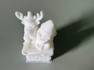 SANTA AND REINDEER IN CHIMNEY