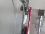 Brush and squeegee holder for shower-7