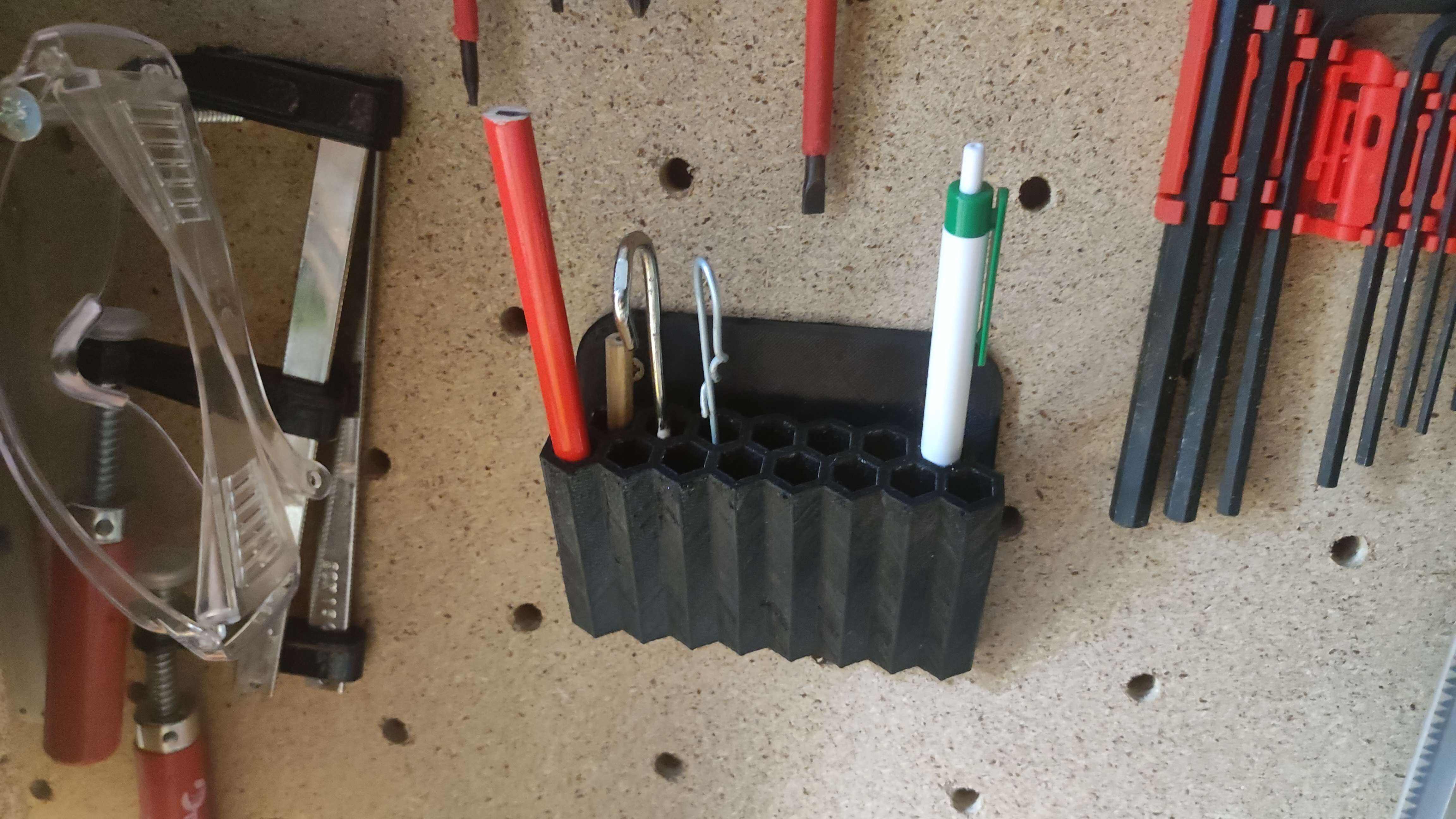 Wall-mounted pen holder