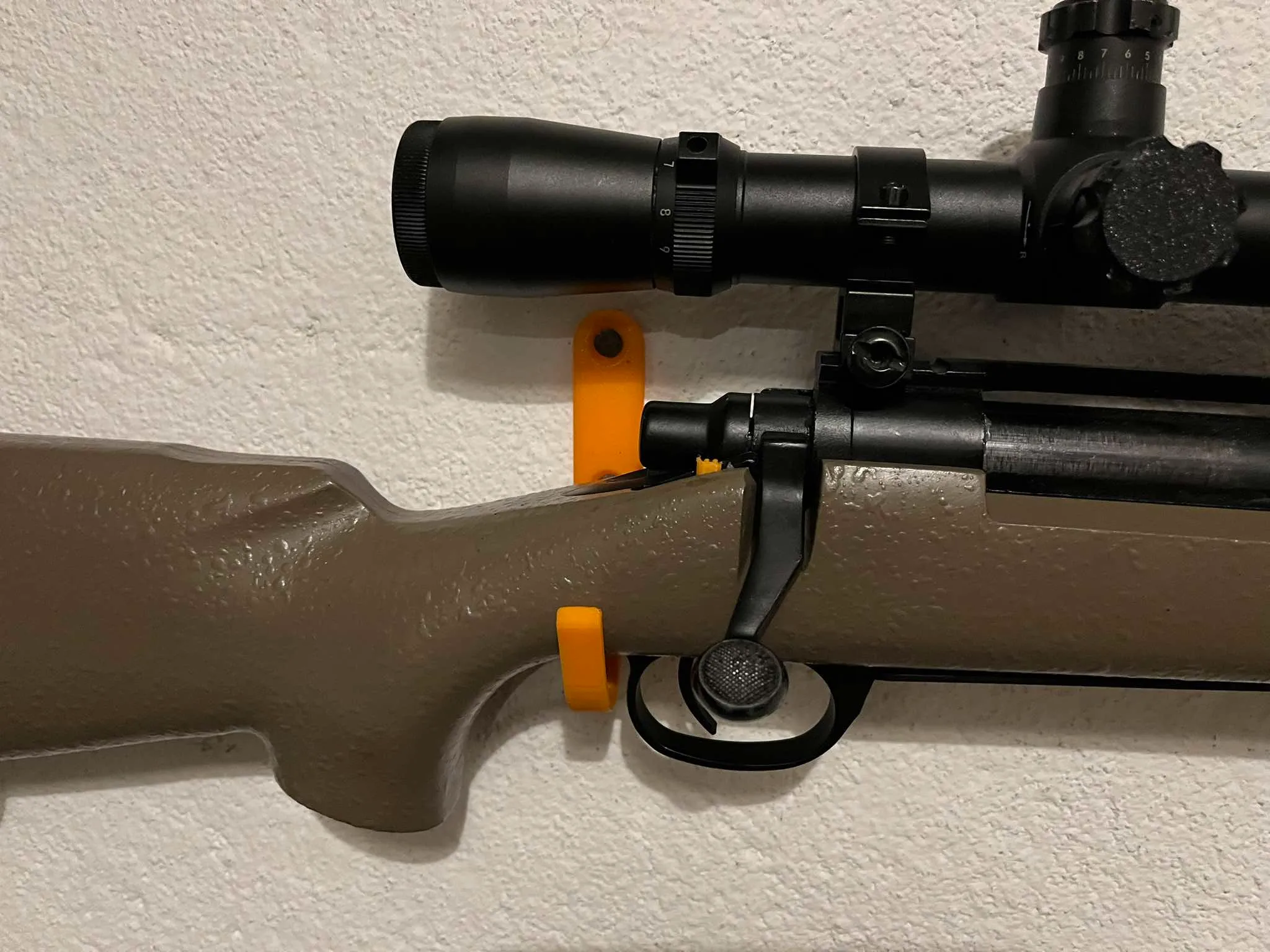 Airsoft gun mounts on the wall