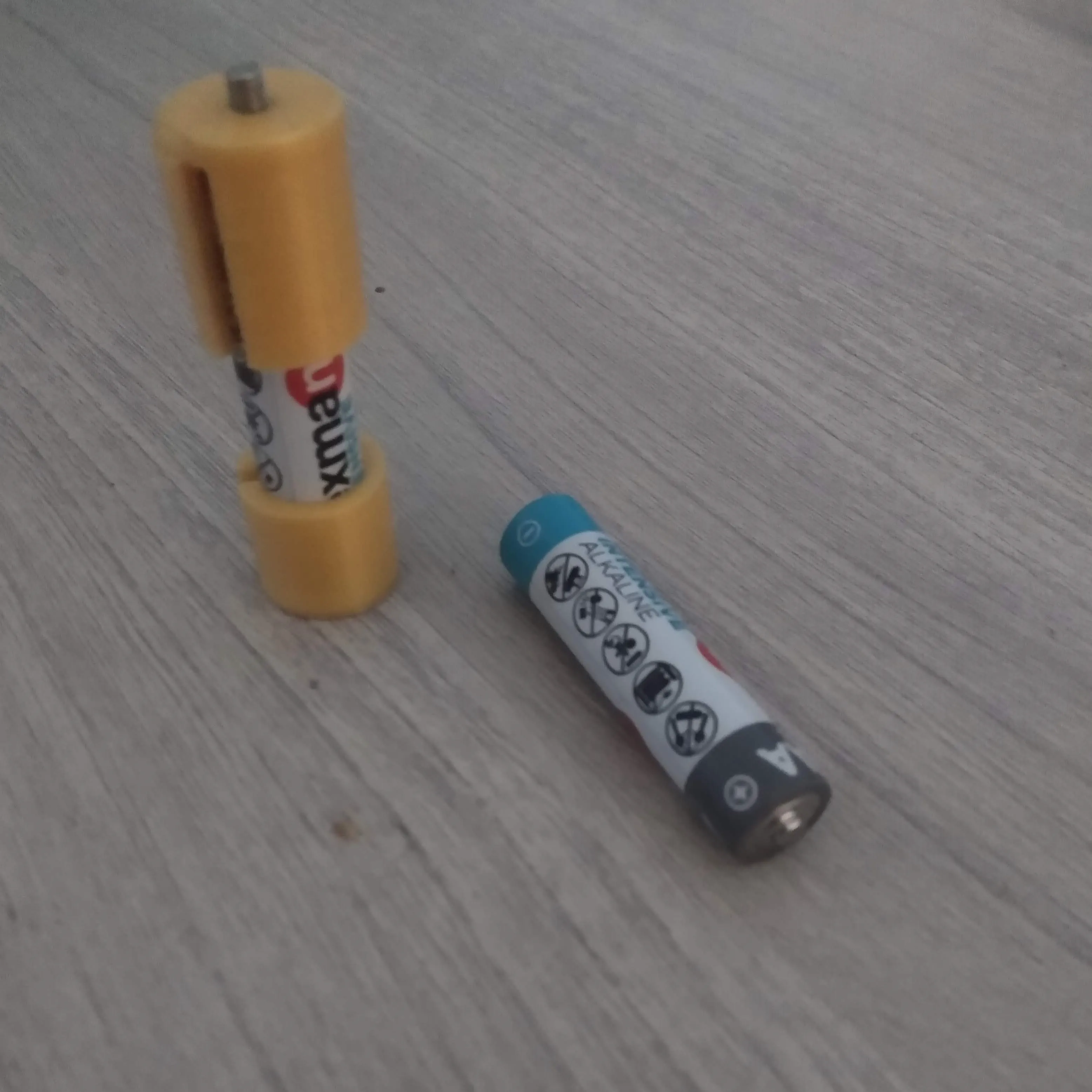AAA to AA converter