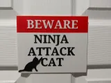 cat warning sign-1