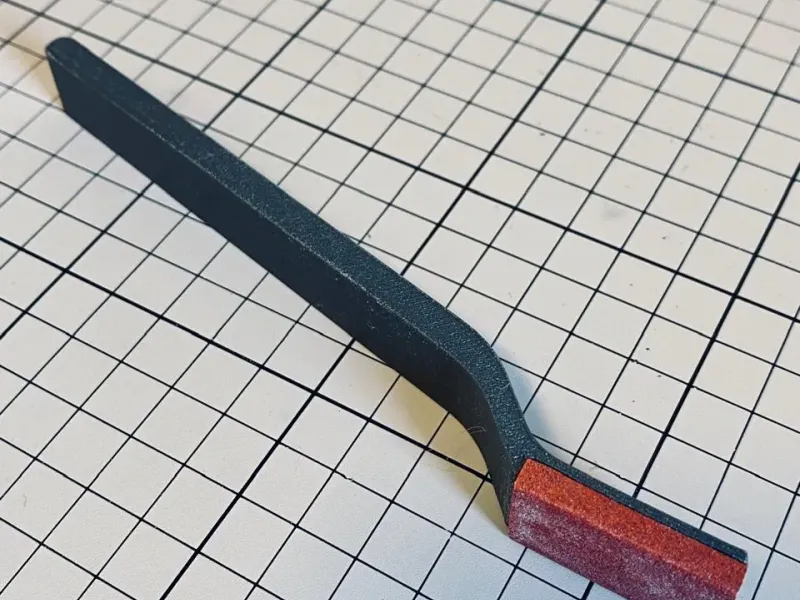 Soporte para papel de lija con asa