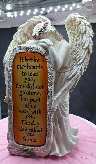 Weeping Angel  it broke our hearts Garden Statue