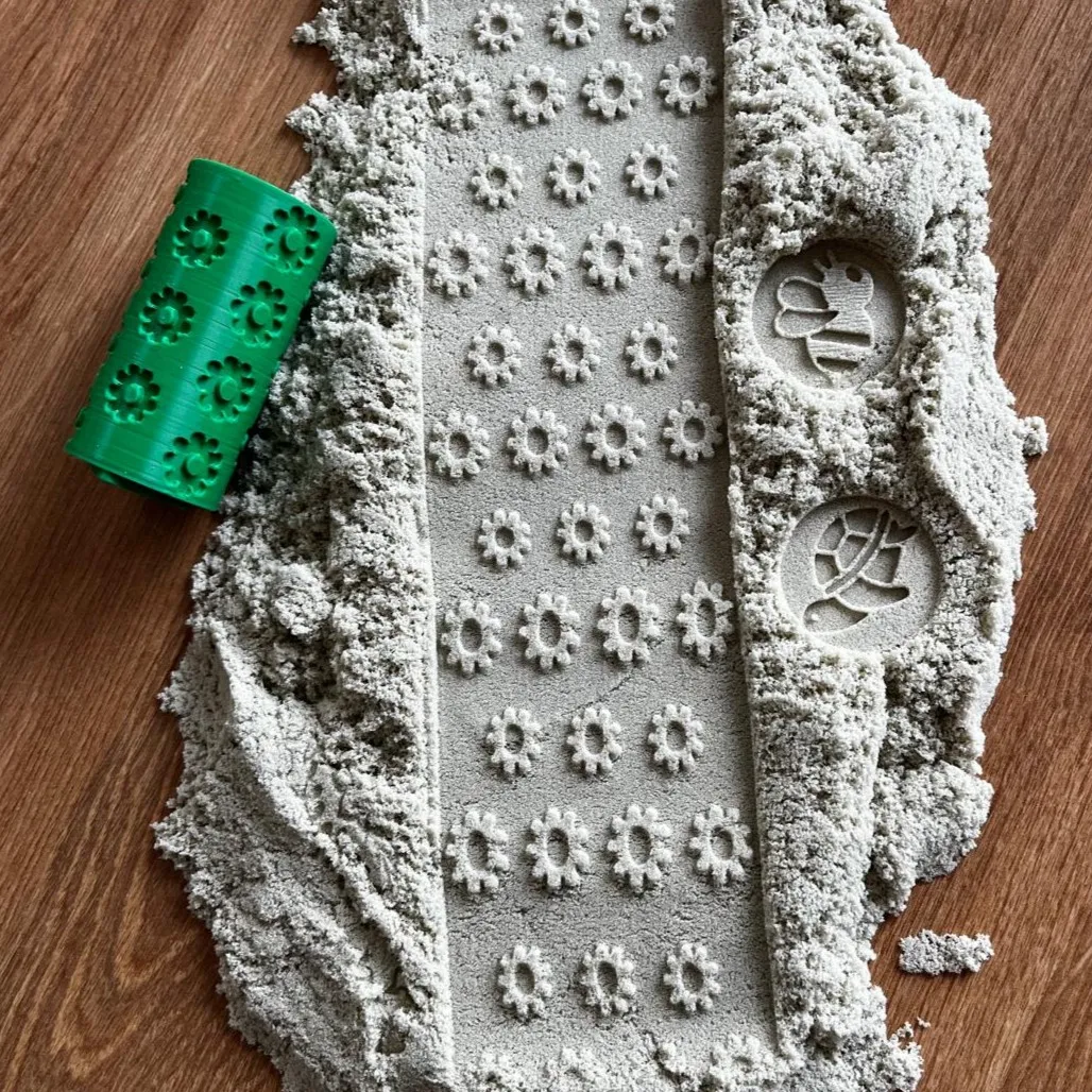 Texture roller of daisy flowers and stamps