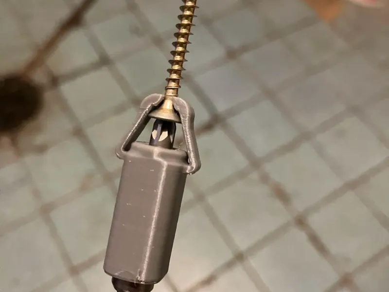 Screw holding device in the bit