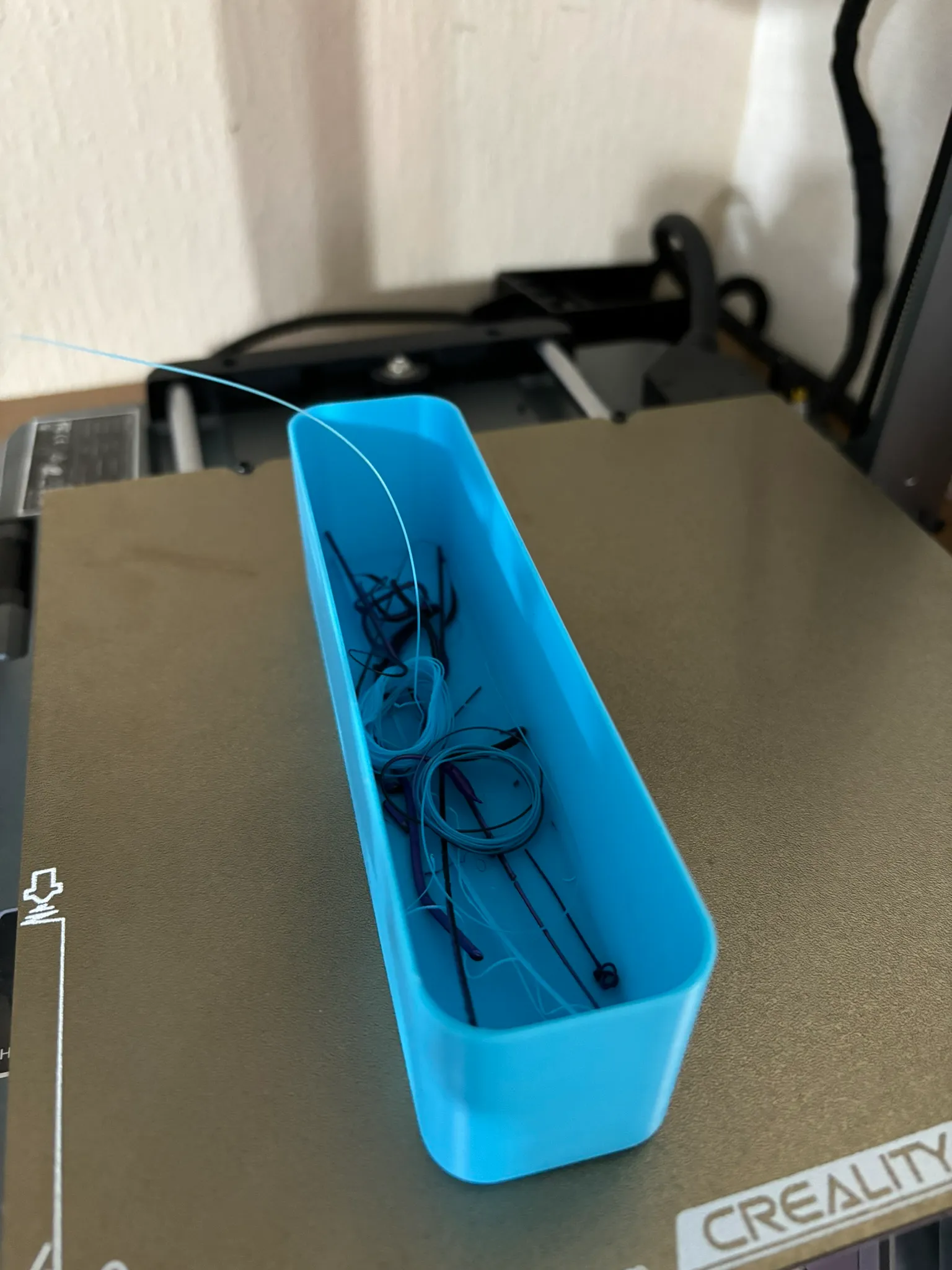 Contenedor de filamento para línea de purga
