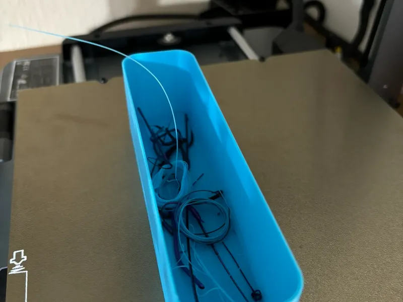 Filament bin for purge line