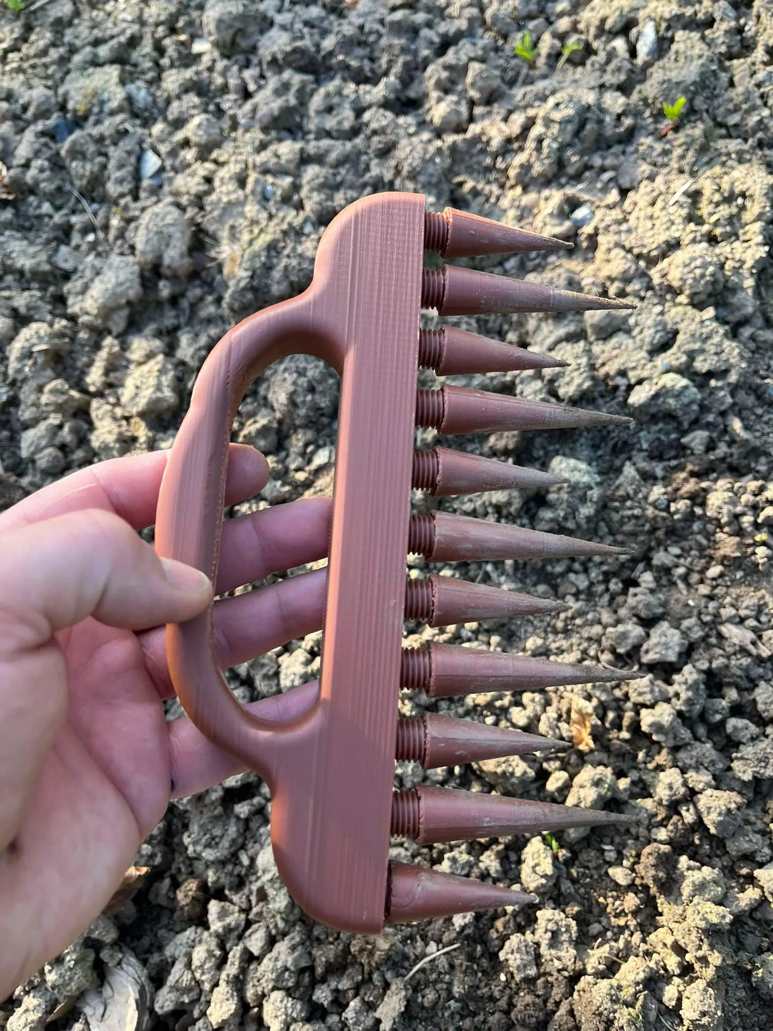 Rake in hand, stake