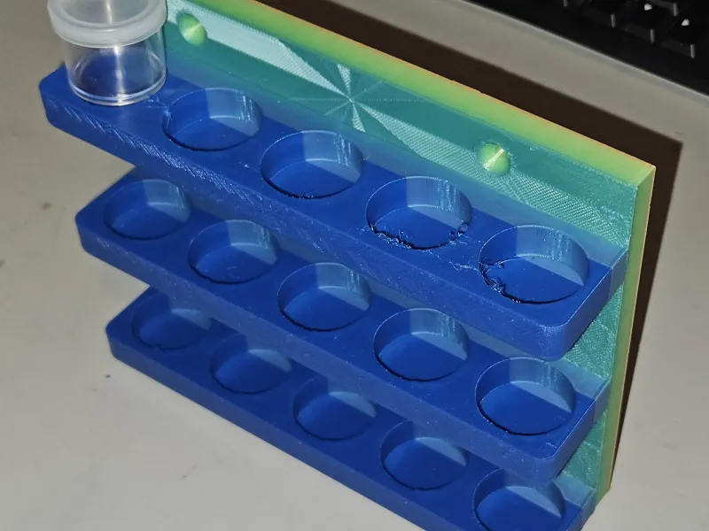 Wall mounted rack for 15 26mm containers