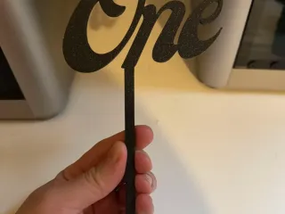 'One' Topper