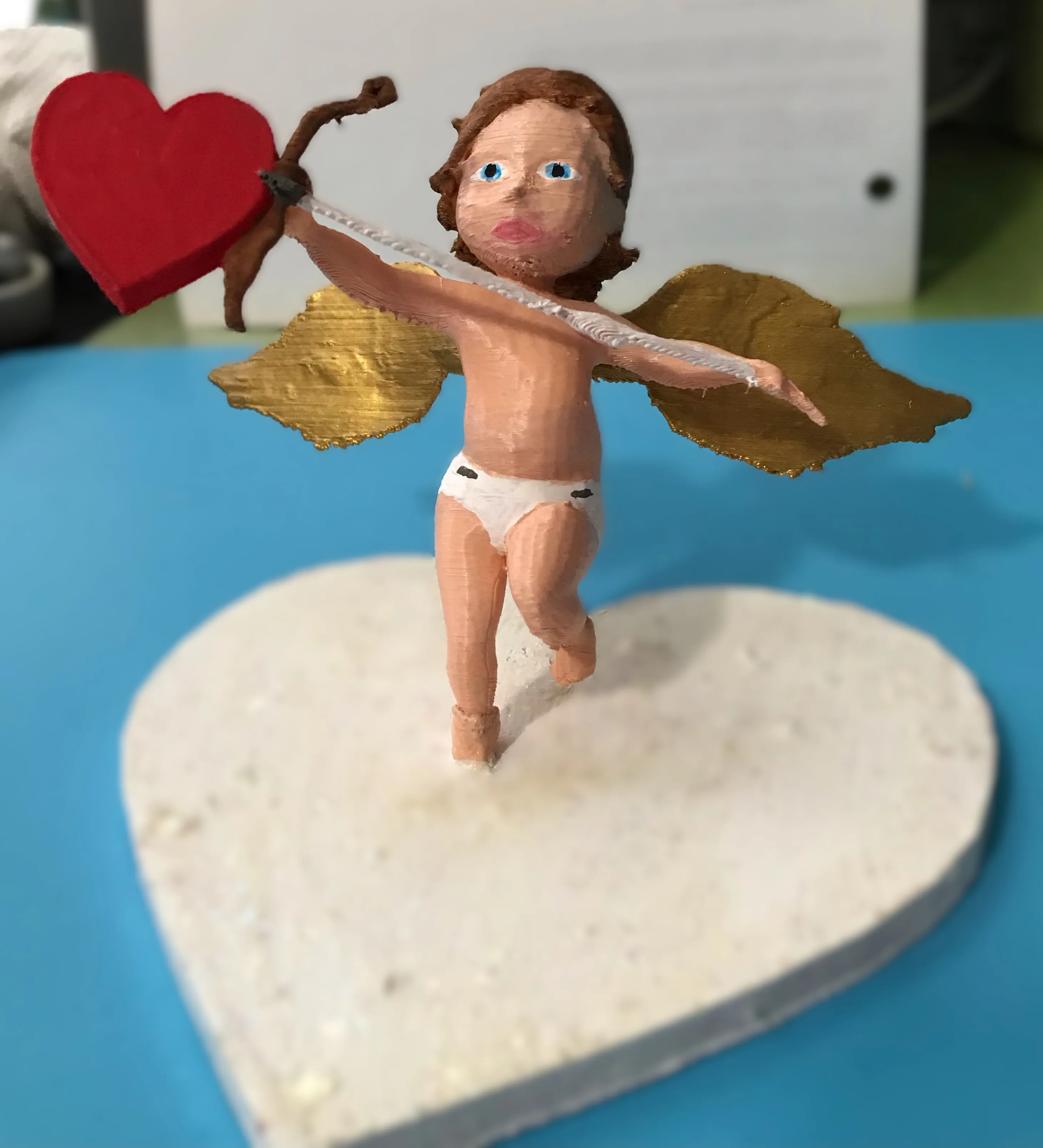 Cupid on a heart