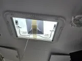 Star caravan in hatch shelf-0