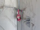 Brush and squeegee holder for shower-6