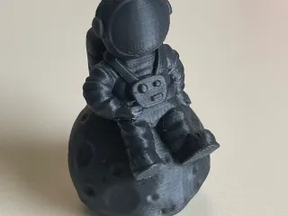 Man sitting on the moon