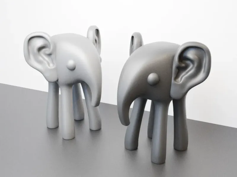 elephant sculphture with human ears