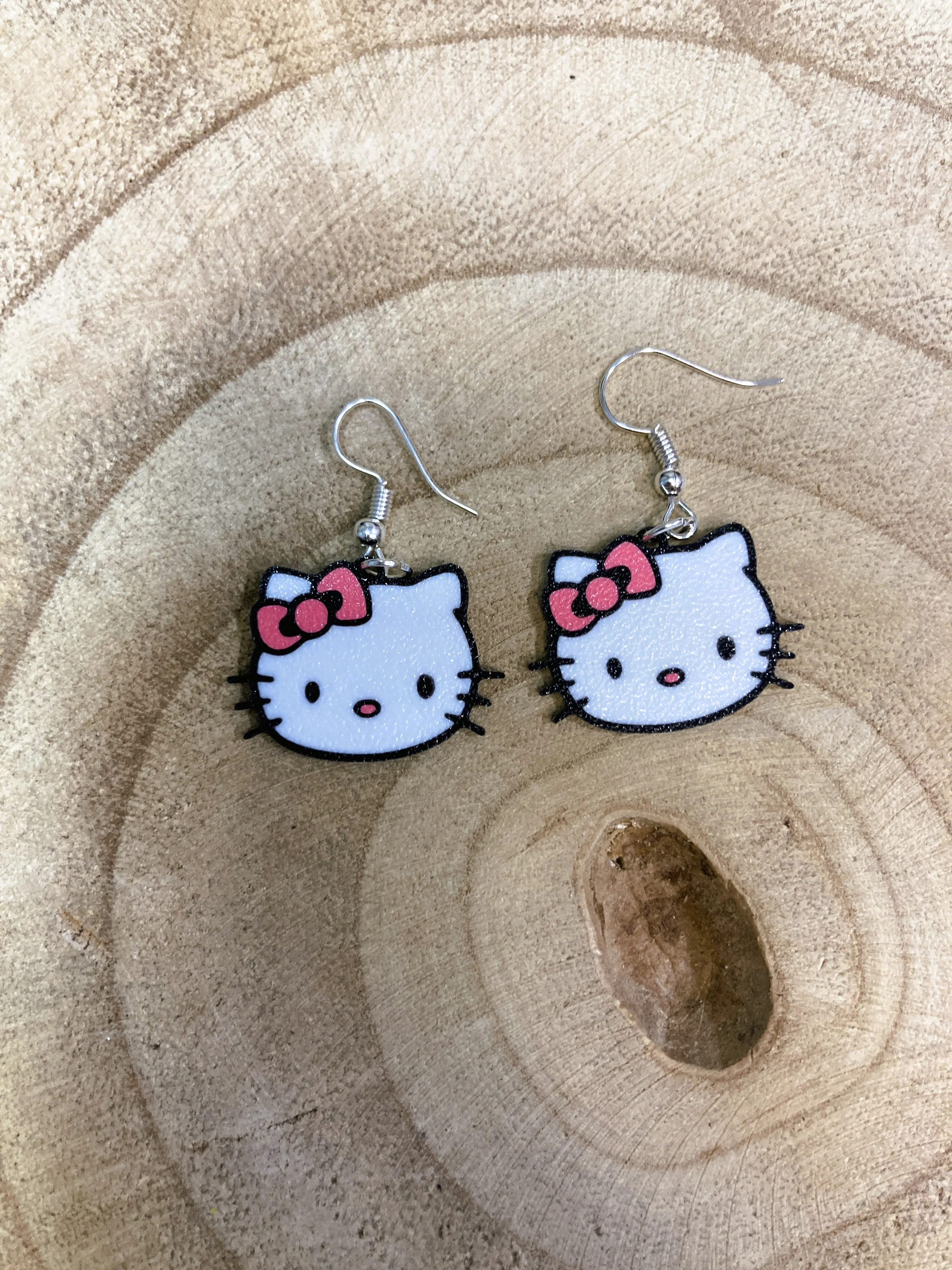 Orecchini con la faccia di Hello Kitty / Pendientes Hello Kitty