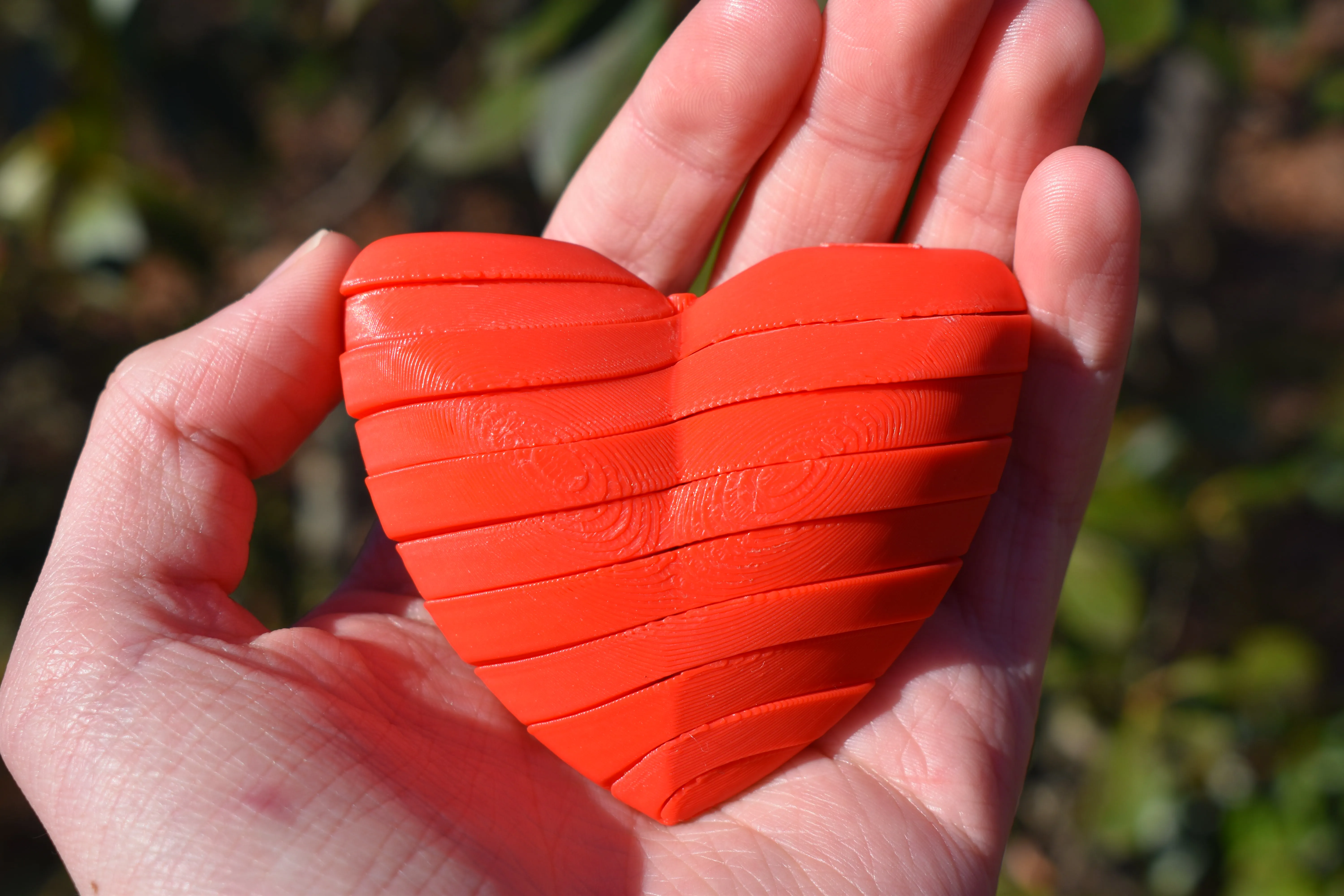 Intertwined Hearts: Fidget, Decoration, and Gift