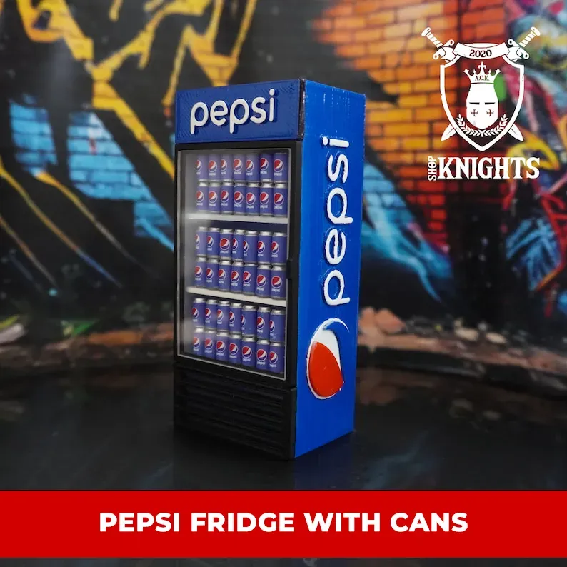 Miniature Pepsi fridge with soda cans and labels
