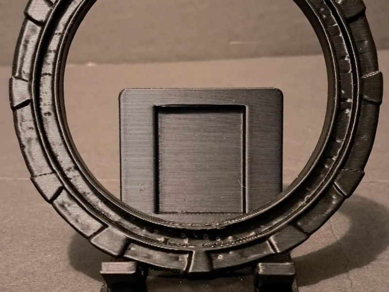 Soporte para teléfono con cargador Qi Stargate