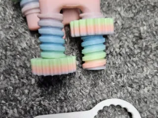 Keychain geared fidget bolt