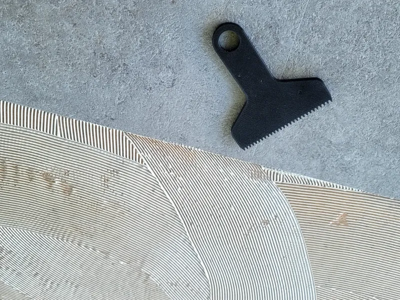 Notched trowel