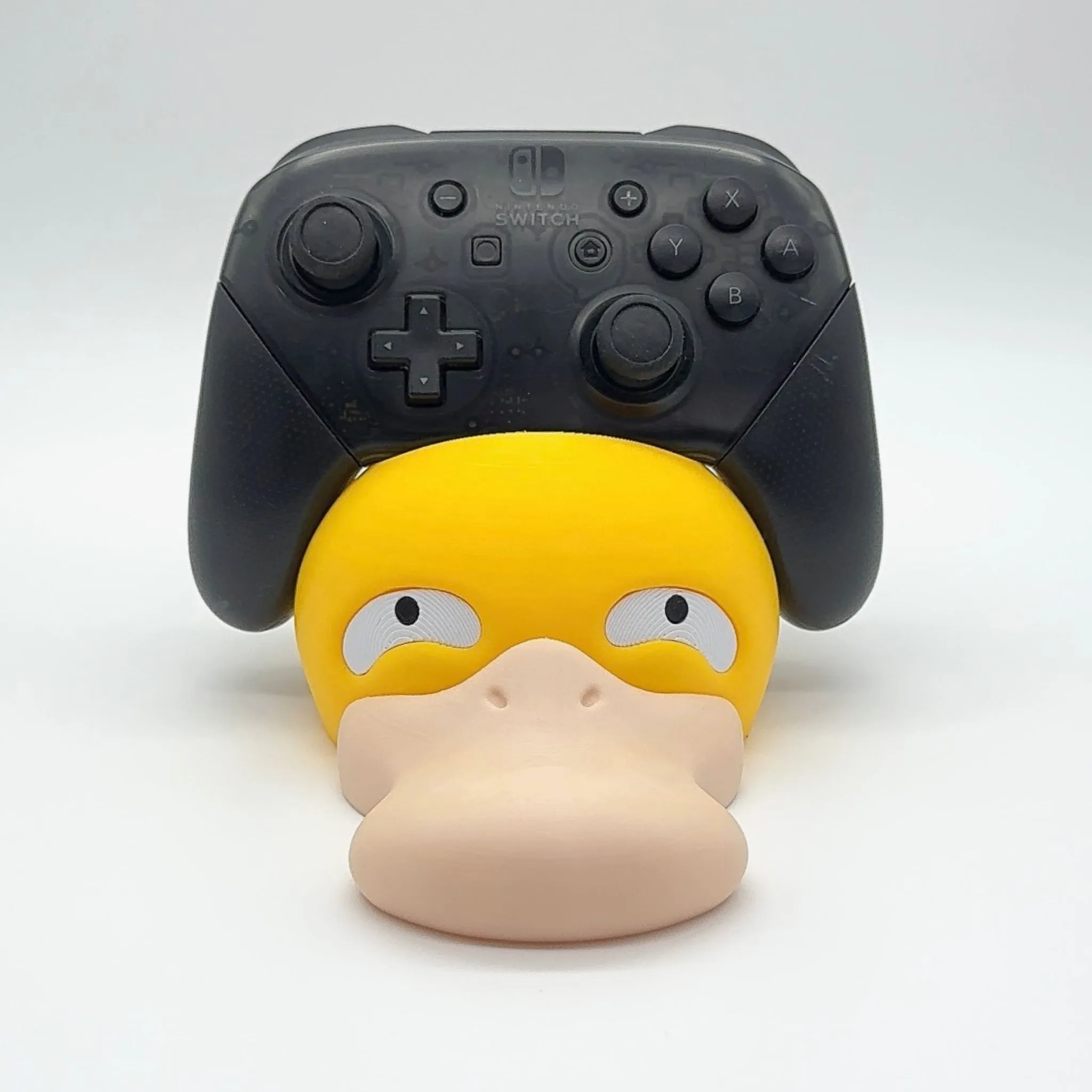 CONTROLER DE TITULAR PSYDUCK - ÎN FUNCȚIE DE CULORI