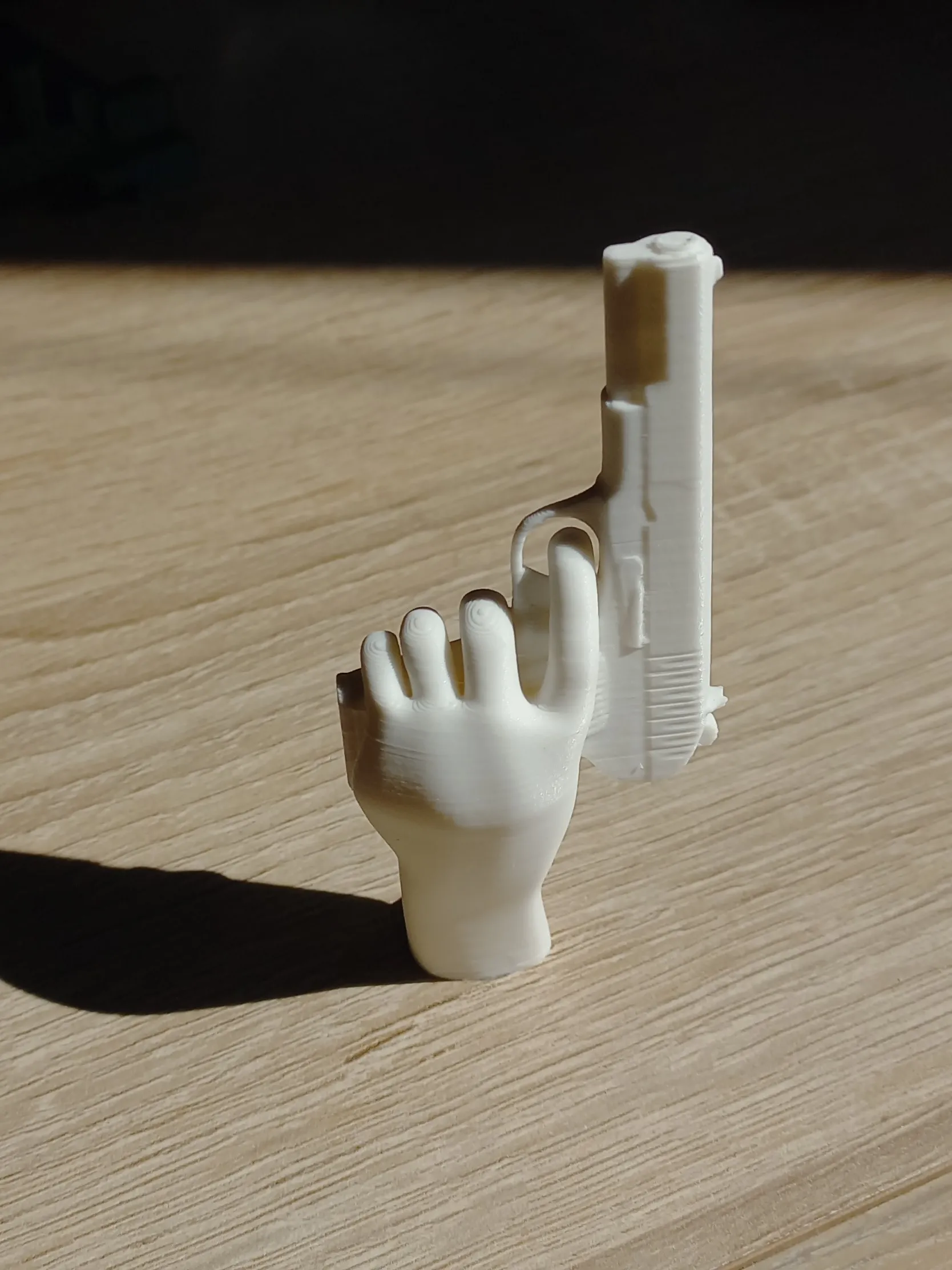 Hand with gun magnet