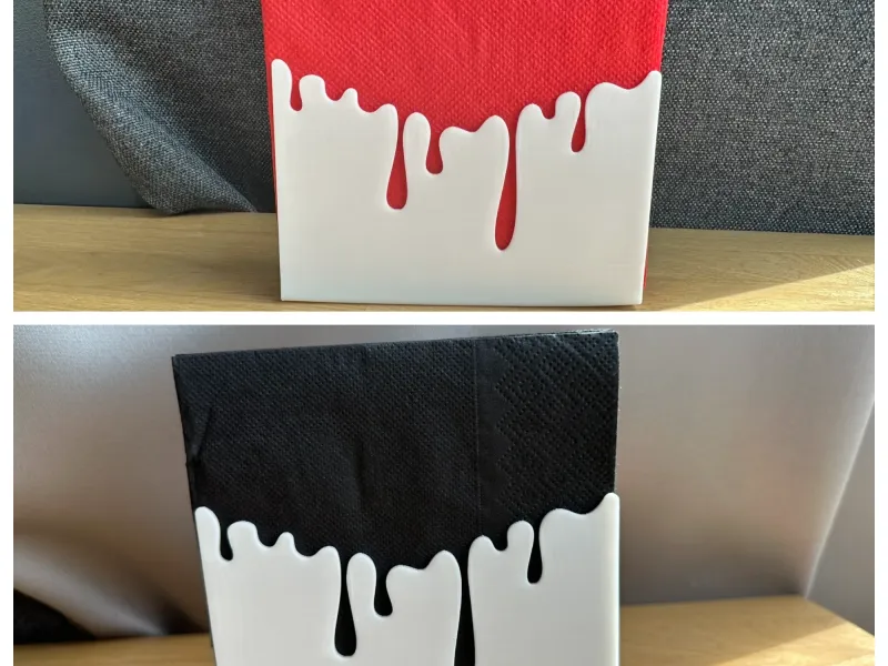 Flowing napkin holder