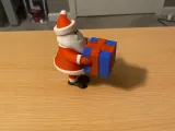 Santa Holding a Present-1
