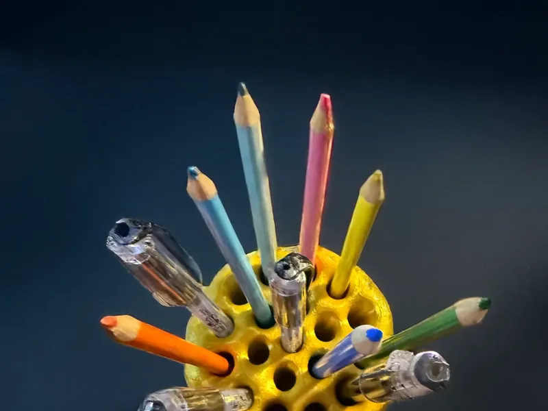 An organic blob shape pencil holder