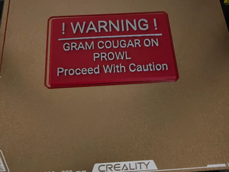 Gram Cougar Warning Sign