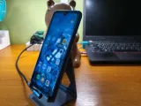 Phone stand for side charging cable-1