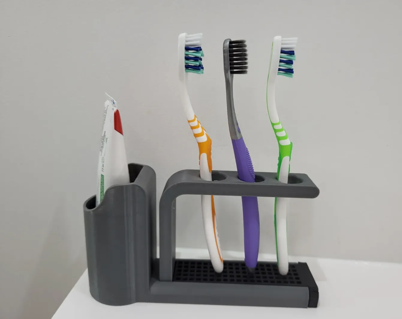 toothbrush and toothpaste holder