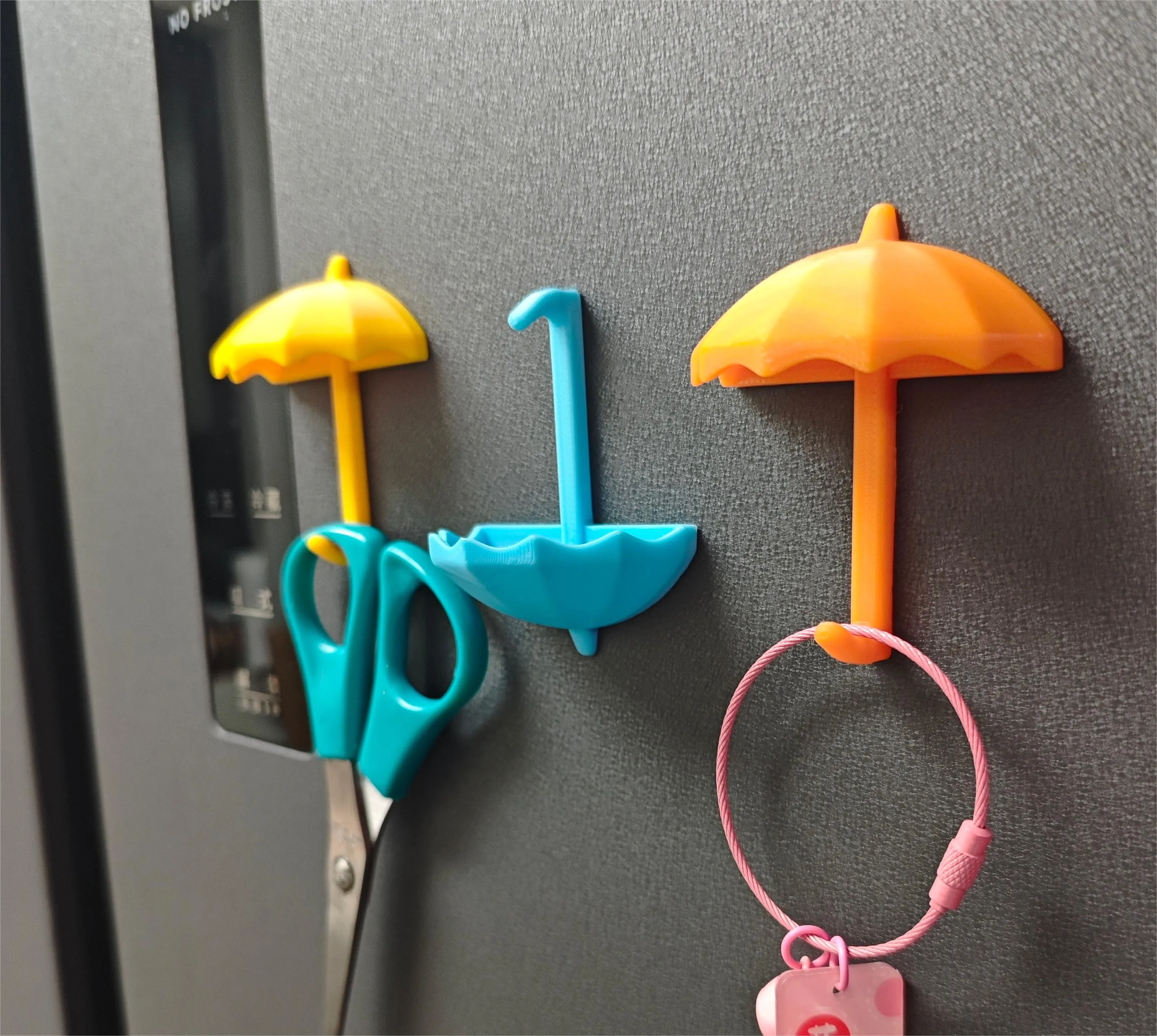 Magnetic refrigerator umbrella hook
