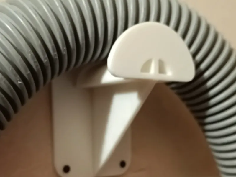 Vacuum cleaner hose storage holder