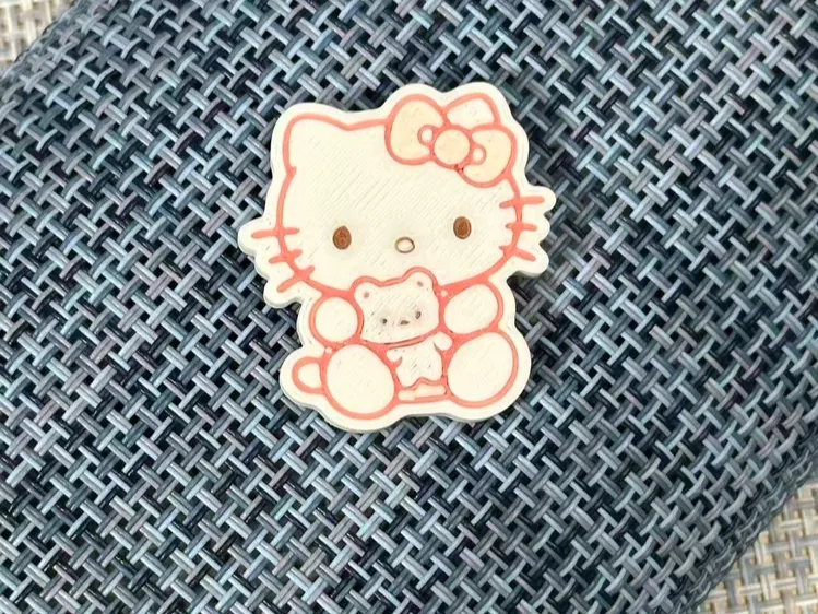 抱着小熊的kt 冰箱贴