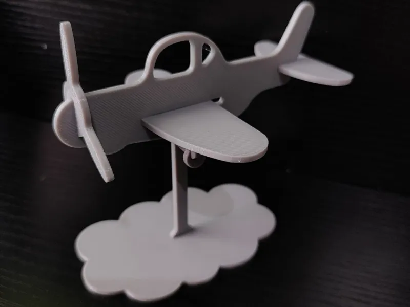 Avión de Juguete Minimalista sobre Nube